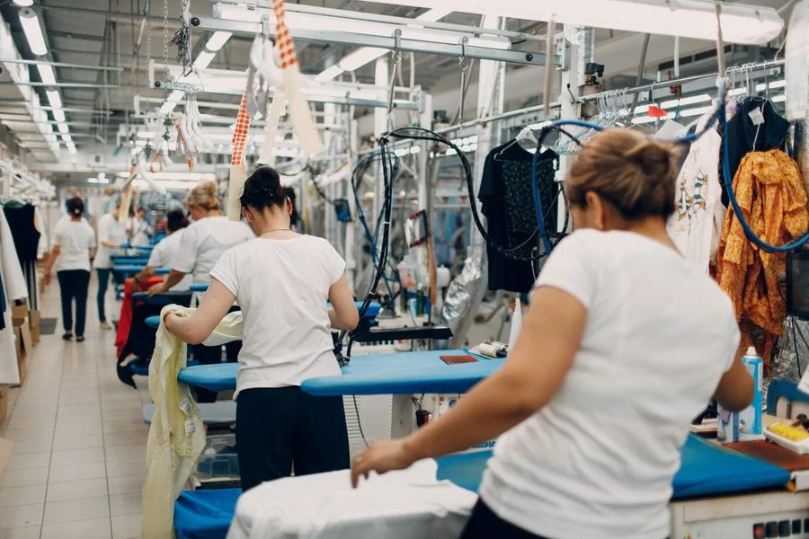 Production line running standardized cut and sew garment programs