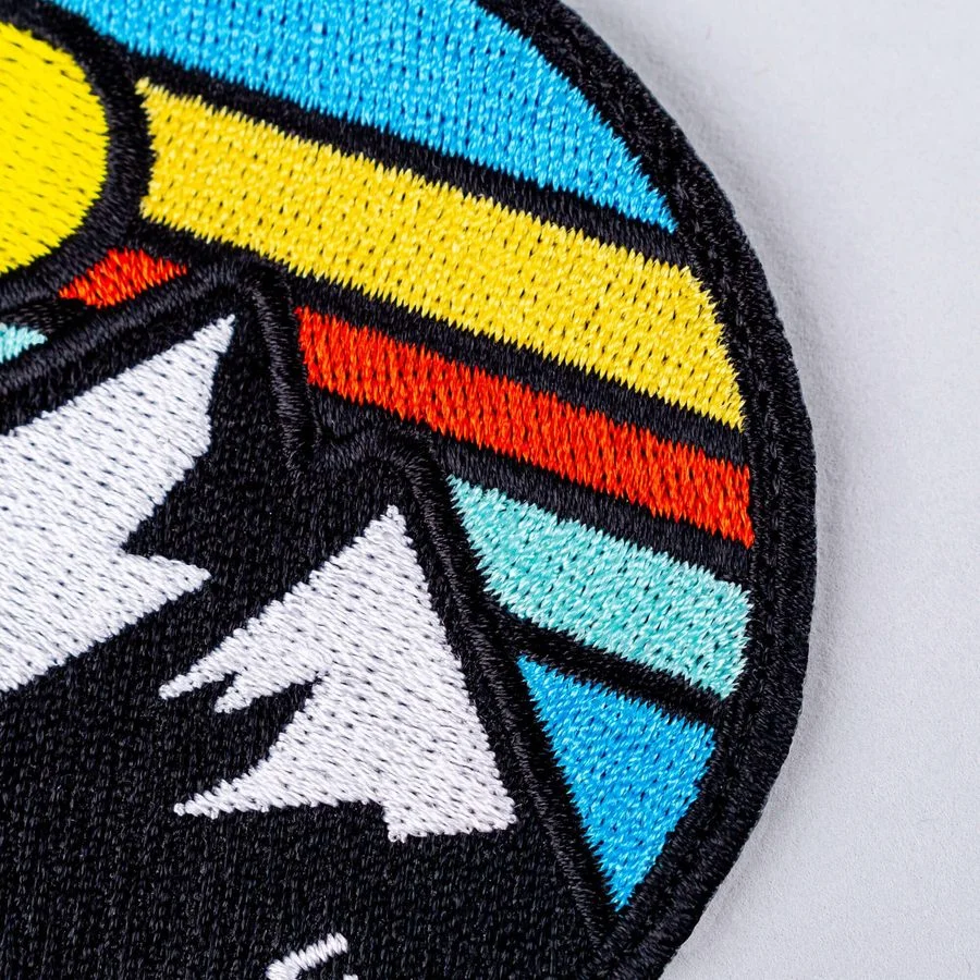 Custom embroidered mountain patch with clean satin borders