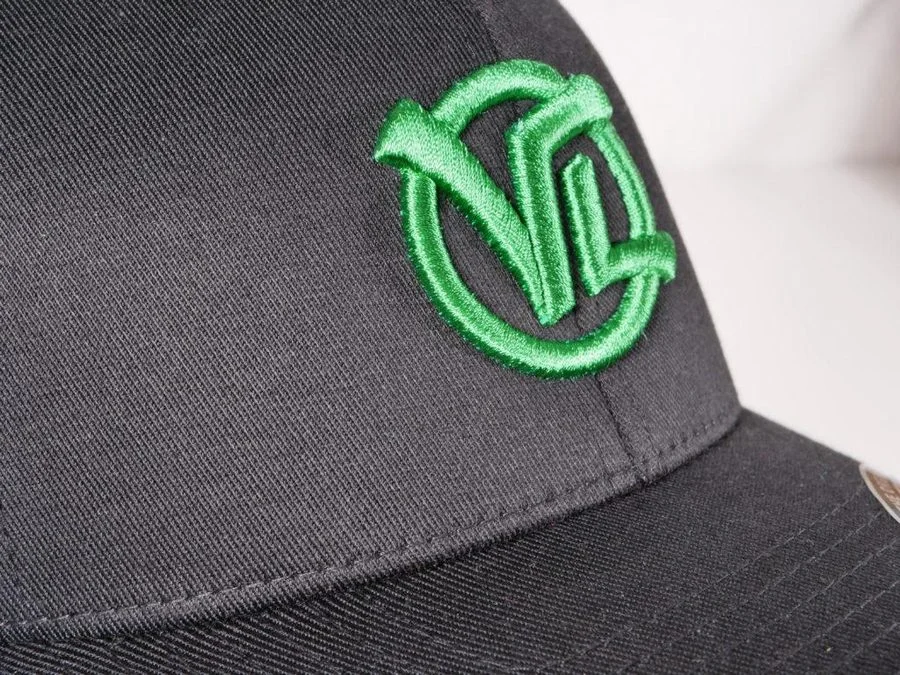 Raised 3D puff embroidery logo on a structured cap