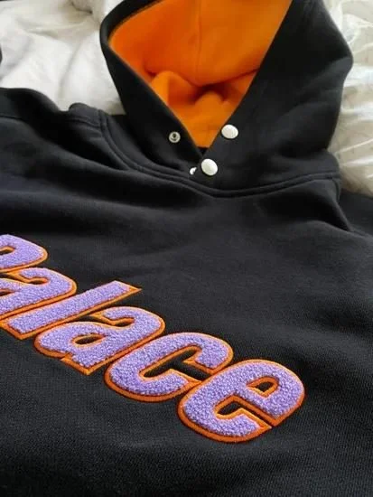 Chenille lettering embroidery on a hoodie